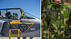 Pilot sitter i Jas Gripen-plan på marken. Anonym fältpräst i kamouflagekläder.