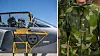 Pilot sitter i Jas Gripen-plan på marken. Anonym fältpräst i kamouflagekläder.