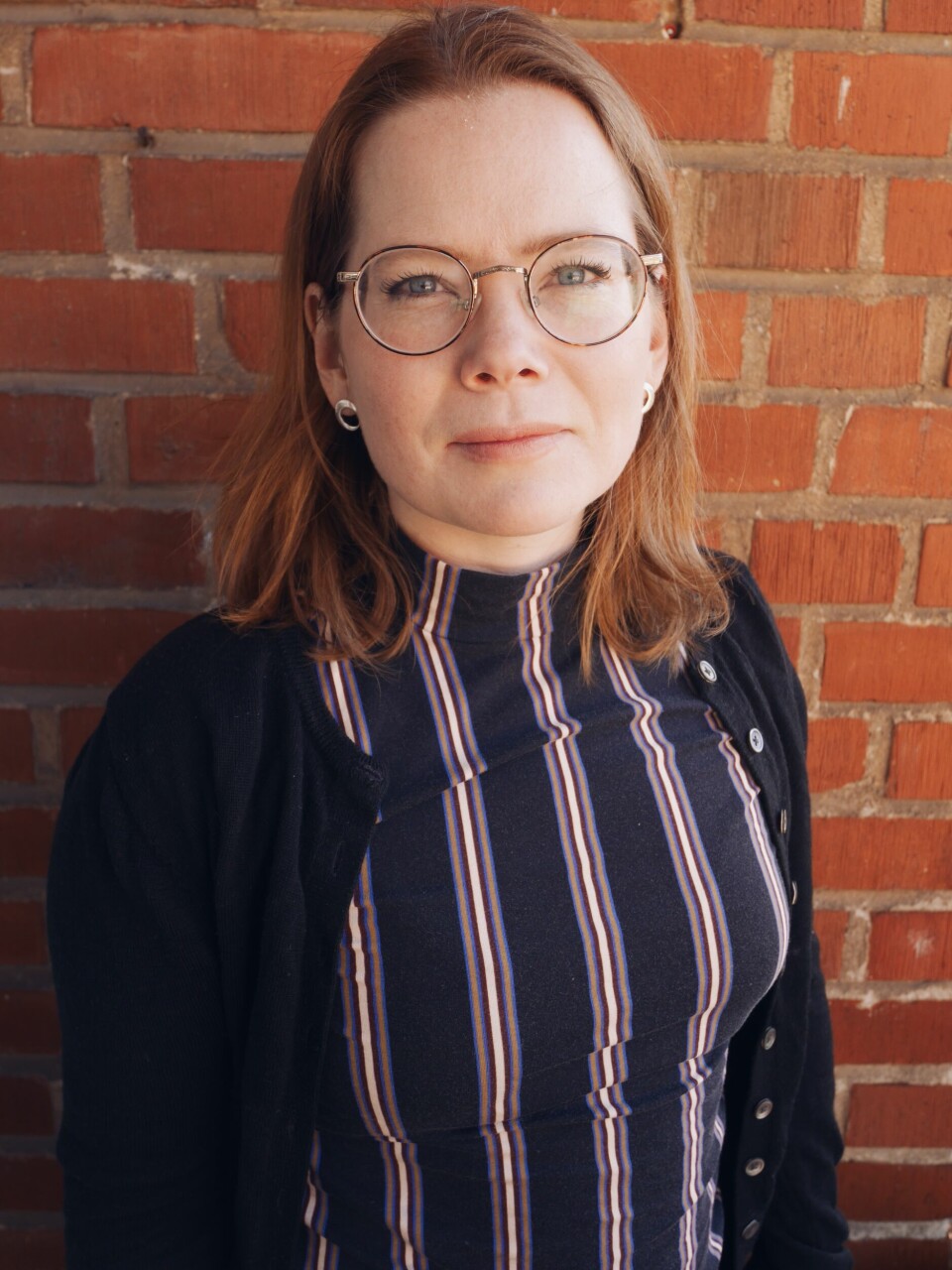 Doktoranden Julia Kuhlin disputerar på en avhandling om pentekostalism i Indien. Hon har intervjuat medelklasskvinnor om hur de lever ut sin kristna tro. Kvinna i glasögon.