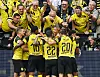 Fans jublar med spelarna i Borussia Dortmund efter ett mål i en match mot Leipzig nyligen.