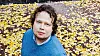 Martin Hallander, KDU:s nya ordförande, står bland gula höstlöv.