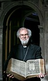 The Archbishop of Canterbury Dr Rowan Williams poses for photographers with the 400 year old King James Bible at Lambeth Palace Library's newest exhibition in London, Wednesday, May 25, 2011. Lambeth Palace Library's new exhibition 'Out of the Original Sacred Tongues', which is open until July 29, 2011, celebrates the 400th anniversary of the King James Version. (AP Photo/Akira Suemori)
