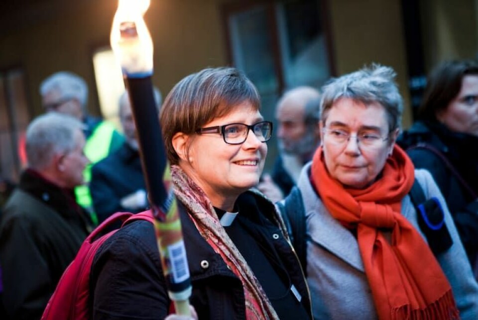 Karin Wiborn. Sveriges kristna råd och Svenska missionsrådet arrangerade den 14 oktober 2013 ett fackeltåg och opinionsmöte på Mynttorget i Stockholm. Syftet var att visa solidaritet med utsatta troende i världen. På bilden: Karin Wiborn, Sveriges kristna råd, och Eva Christina Nilsson, generalsekreterare för Svenska missionsrådet.