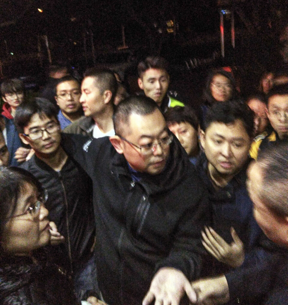 September 2017: Pastor Wang Yi goes to the police station to retrieve Brother Ding Shuqi, who had been arrested.
